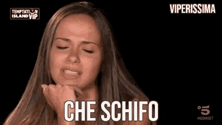 a woman is crying with her eyes closed and the words che schifo written on the screen .