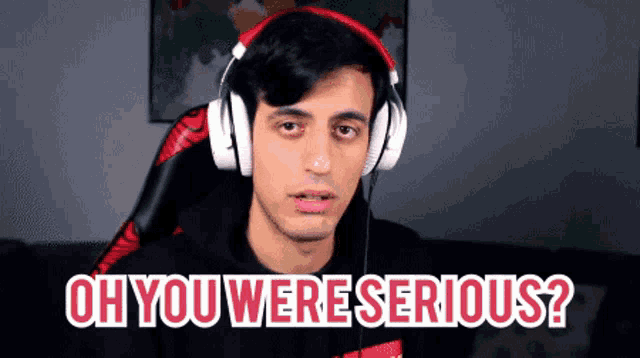 a man wearing headphones with the words oh you were serious below him