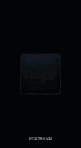 a computer chip with a clock on it and the words mix by wing akm below it
