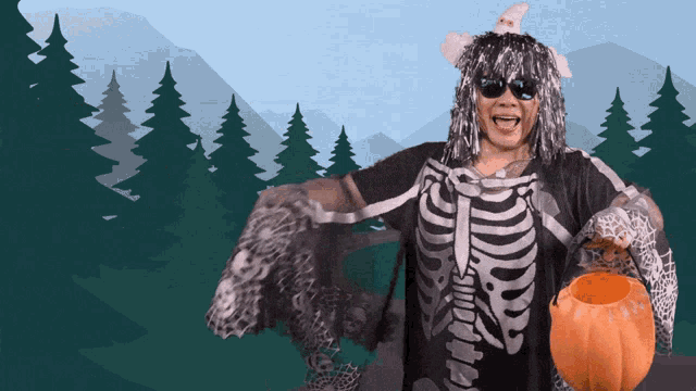 a woman in a skeleton costume holding a pumpkin