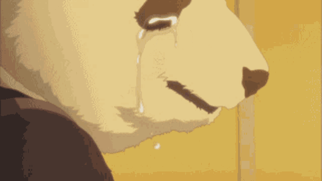 a cartoon bear is crying with tears coming out of his eyes