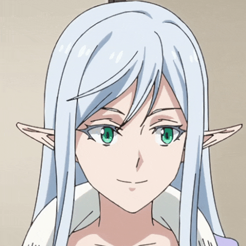 a woman with long white hair and elf ears smiles with her eyes closed