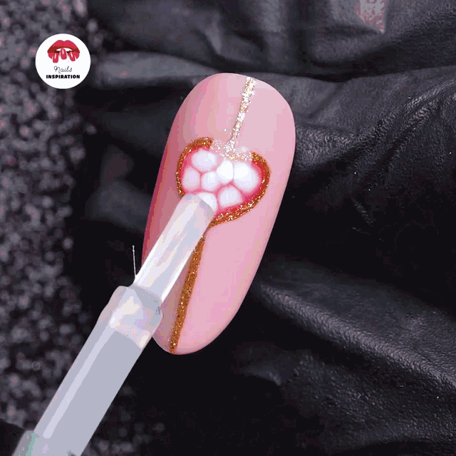 a close up of a nail with a nail polish brush that says rude inspiration