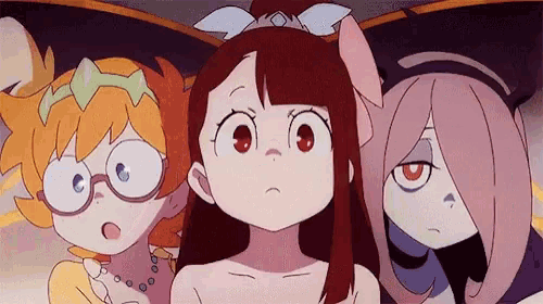 a group of three anime girls are standing next to each other and looking at the camera .