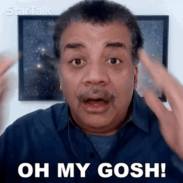 a man with a beard is making a funny face and says oh my gosh !