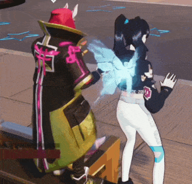 a man and a woman are standing next to each other in a video game and the woman has a blue light coming out of her back