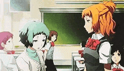 a group of anime girls are standing in a classroom .