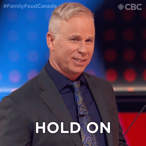 Hold On One Sec Gerry Dee GIF - Hold On One Sec Gerry Dee Family Feud Canada GIFs