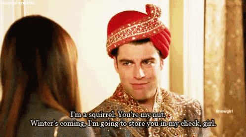 a man in a turban is talking to a woman and says i 'm a squirrel .