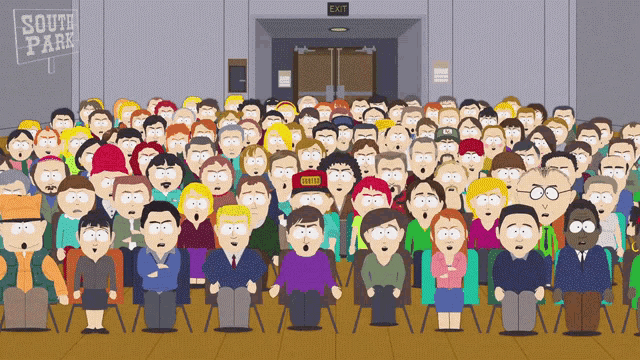a crowd of people are sitting in front of a south park sign