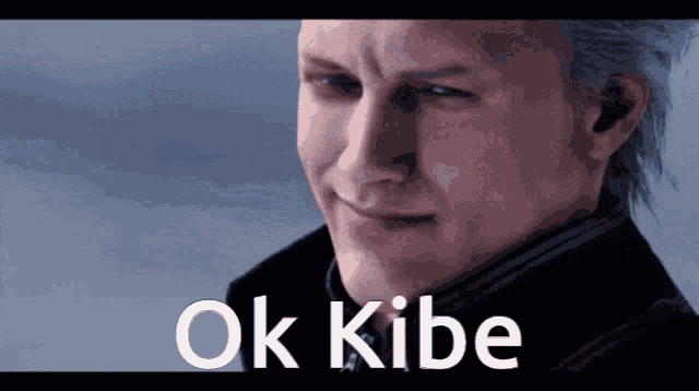 a close up of a man 's face with the words ok kibe written below it