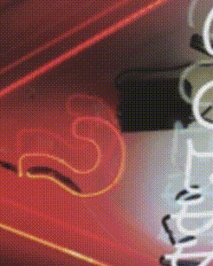 a close up of a neon sign that says ' i love you '