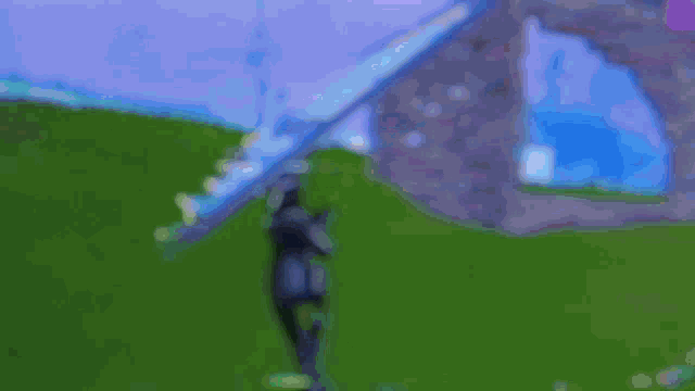 a blurry picture of a person in a video game with a purple sky in the background