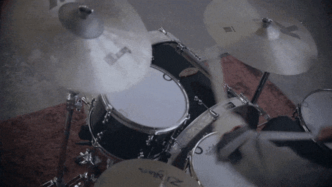 a zildjian drum set is being played