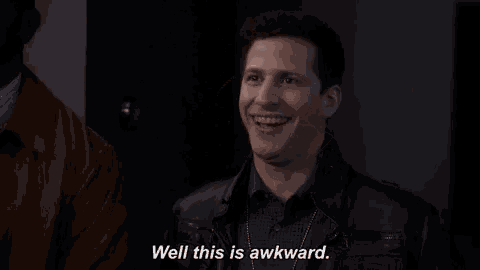 a man says " well this is awkward " in a dark room