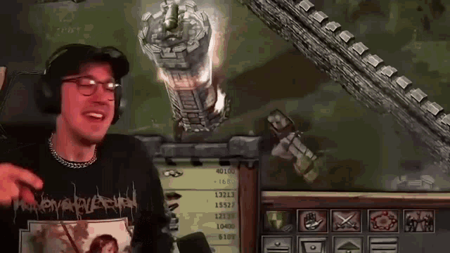 a man wearing headphones is playing a video game while wearing a shirt that says ' apocalypse ' on it
