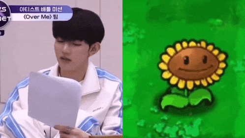 a man is holding a piece of paper next to a picture of a sunflower from plants vs zombies .