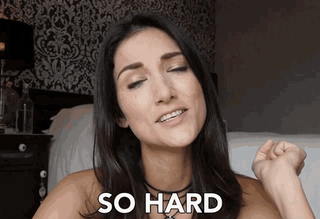 a woman with braces on her teeth is making a funny face and says so hard