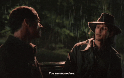 two men sitting on a bench in the rain with one saying you summoned me