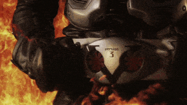 a person wearing a version 3 belt stands in front of flames