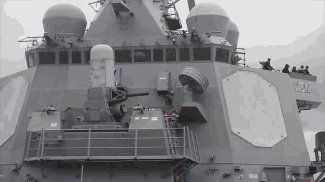 the front of a military ship with the letters nmr on the side