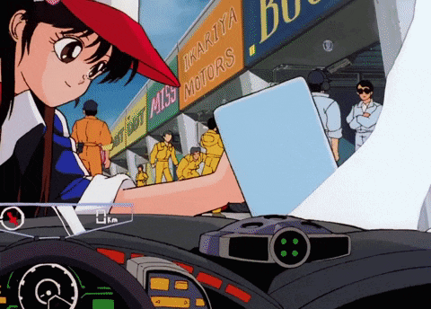 a woman is looking at a laptop in front of a sign that says d'kariya motors