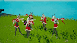 a group of people dressed in santa costumes are dancing in a field