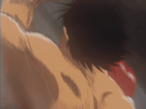 a close up of a person 's back with a blurred background