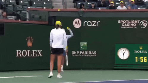 a tennis match is being played in a spotlight casino