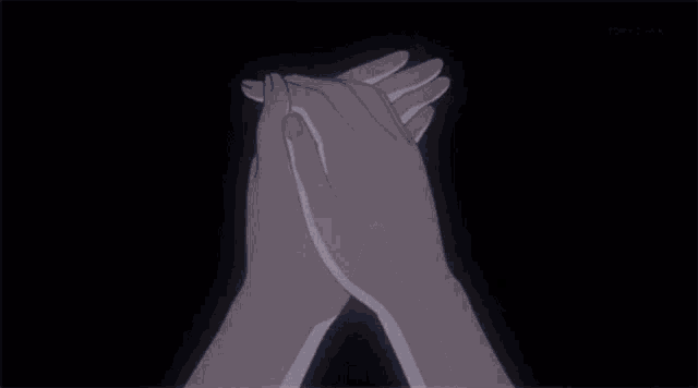 a person is holding something in their hands that glows