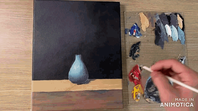 a painting of a vase is being painted on a canvas with the words made in animatica on the bottom