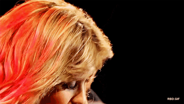 a close up of a woman 's face with rbd.gif written below her