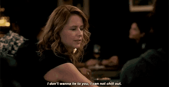 a woman is sitting at a table and says i don 't wanna lie to you i can not chill out