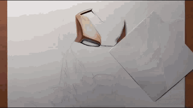 a drawing of a person 's face is being created on a piece of paper