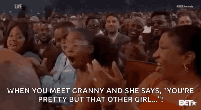 a woman in a crowd says " when you meet granny and she says , you 're pretty but that other girl ... "