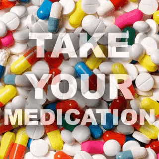 a pile of pills and capsules with the words take your medication written on it