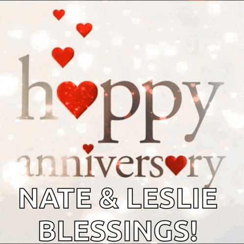 a happy anniversary card for nate and leslie with red hearts