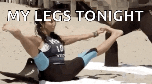 a woman is laying on the beach with her legs crossed and the words `` my legs tonight '' written above her .
