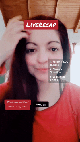 a woman in a red shirt has a liverecap sticker on her head