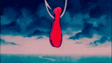 a red necklace is hanging from a hook in the sky