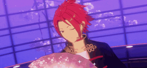 a person with red hair is holding a fan