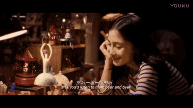 a woman sitting in front of a merry go round with the words so why do you have written on the screen