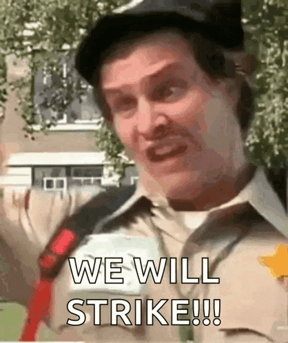 a man in a hat is making a funny face and saying we will strike !!!