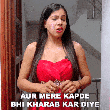 a woman in a red dress says " aur mere kapde "