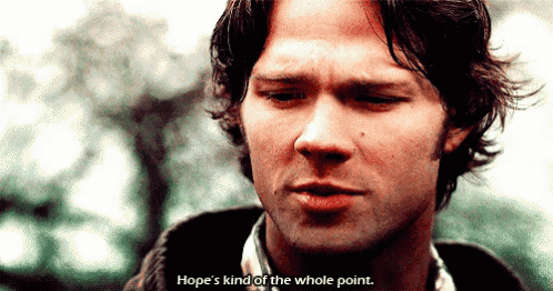 a close up of a man 's face with the words hope 's kind of the whole point next to him