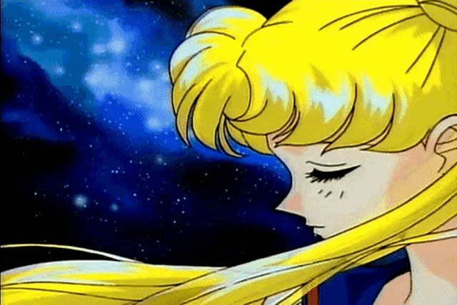a close up of a woman 's face with her eyes closed in front of a starry sky .