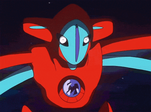 a red and blue cartoon character with a blue circle in the middle of his chest