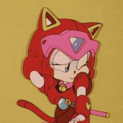 a cartoon character dressed as a cat with a helmet and ears .