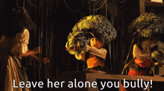 leave her alone you bully written on a screen
