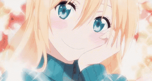 a close up of a blonde anime girl with blue eyes and a blue sweater .